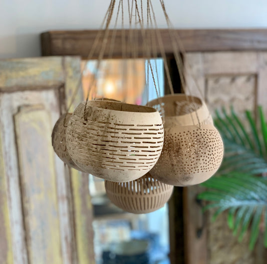 Hanging painted coconut
