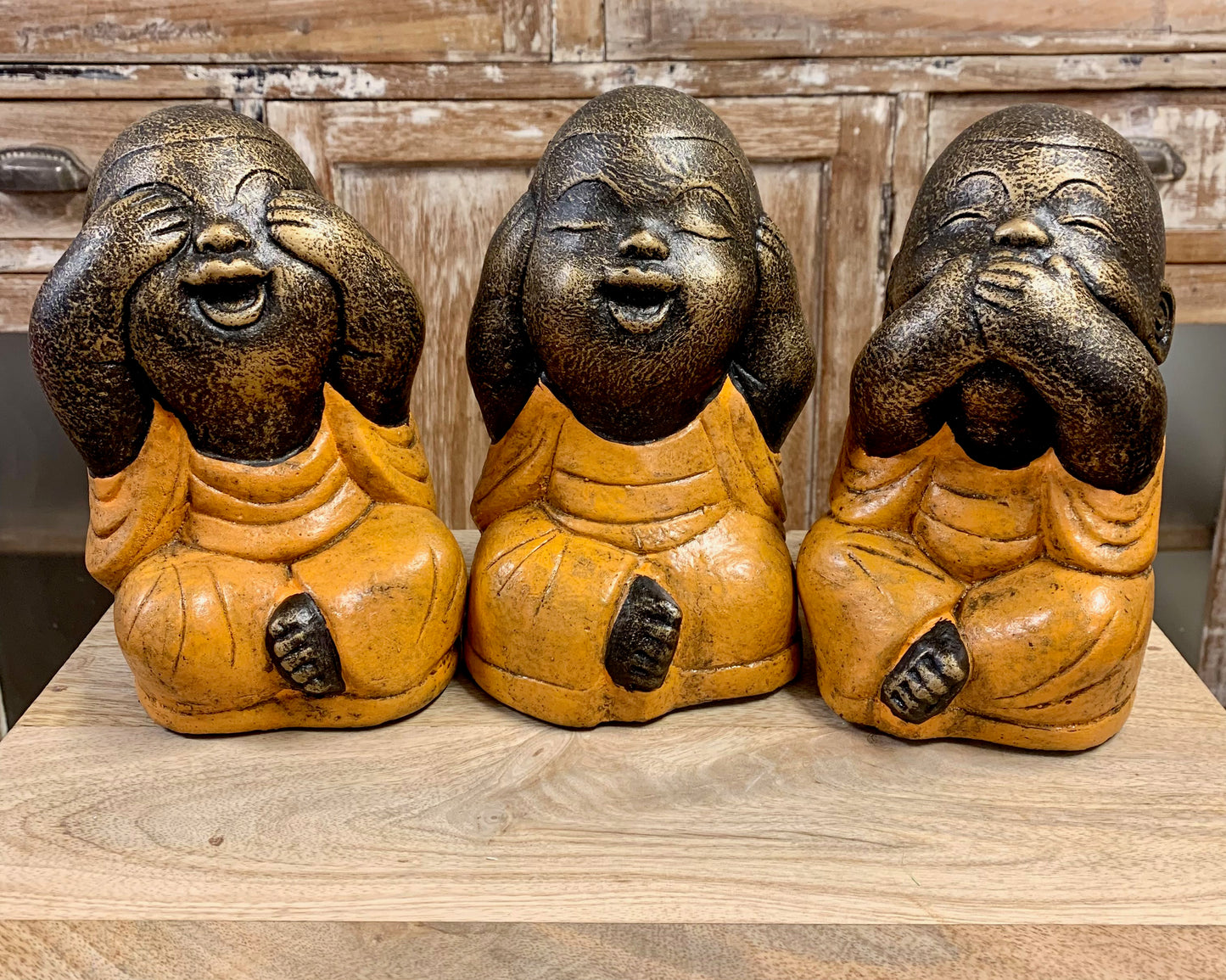Three happy buddhas